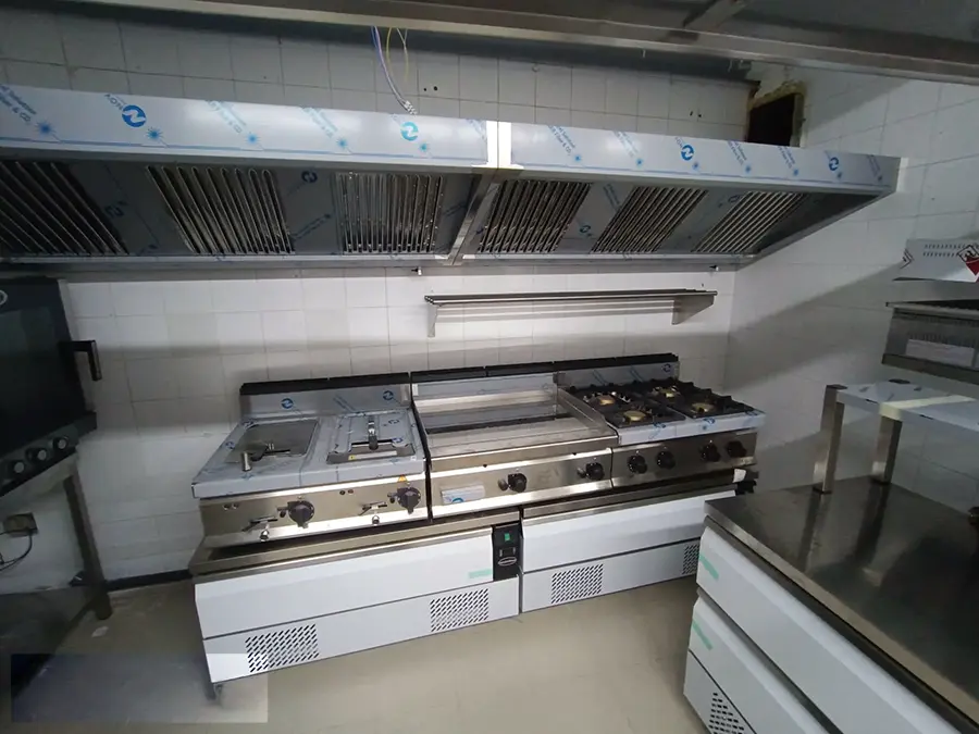 Bertos Macros 700 cooking line with extraction canopy above, installed at Joe's Street Pizza, Nadur, Gozo